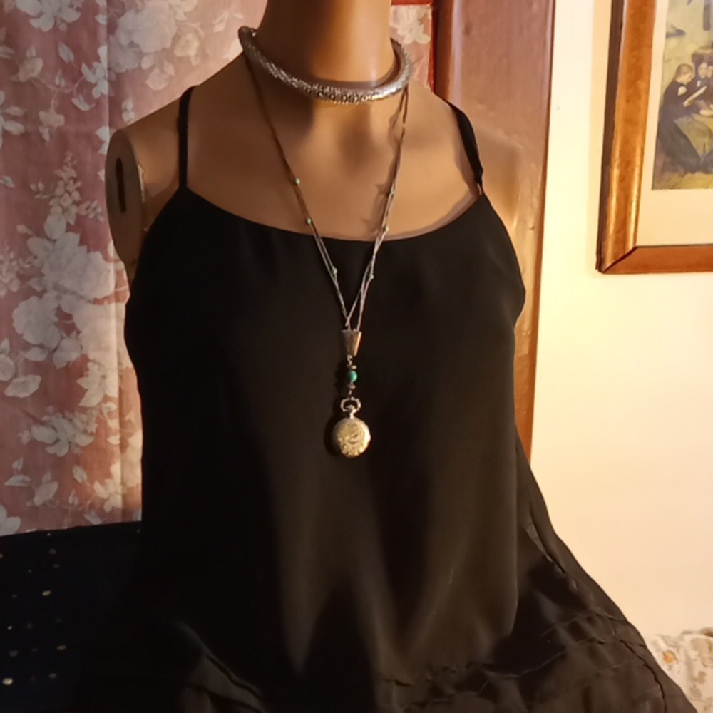 Isabel lu halter top  adjustable straps and polyester lining.Sz XS